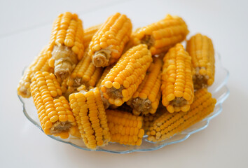 Boiled fresh organic corn on a plate.