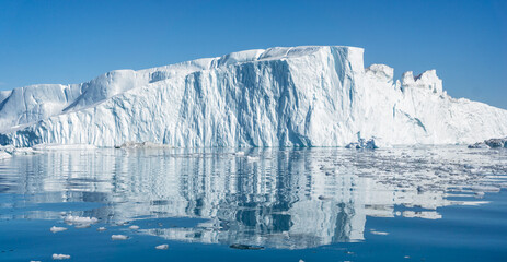 Towering great icebergs in the Ilulissat Icefjord in Greenland © Nigel