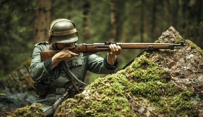 A Finnish soldier during World War II on the Karelian Isthmus. A soldier of the Finnish army shoots...