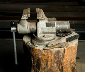 metal vise on a dark background