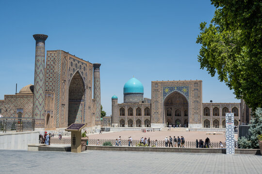 Samarkand, Uzbekistan - 14 June 2022: Tourists visiting famous Registan ansamble in Samarkand city