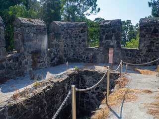 Ruins of an ancient castle. At the archaeological site. Ruined Palace Museum.   The architecture of...