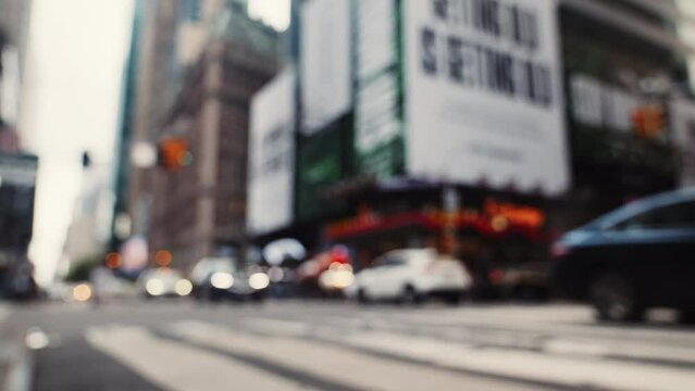 Zebra Crossing and Traffic on the Road of New York. Defocused Cityscape
