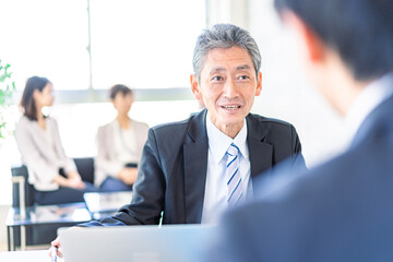 Salesman having a business meeting