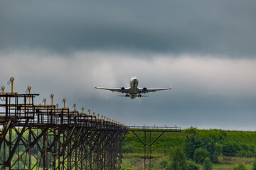 Fototapeta na wymiar Take-off of a jet passenger liner at the airport
