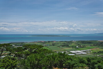 Okinawa,Japan - July 3, 2022: Taketomijima or Taketomi island viewed from Ishigakijima island, Okinawa, Japan
