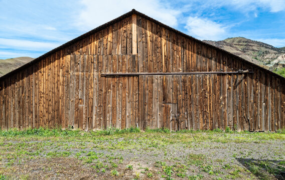 The front of an old wood barn on a ranch in central Oregon, USA