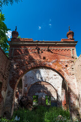 Naklejka premium The ruins of red brick Suntazi Orthodox Church, Latvia.