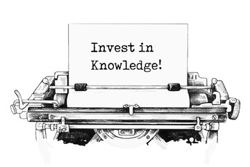 Text Invest in Knowledge typed on retro typewriter