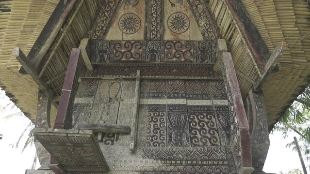 Tongkonan Traditional Ancestral House in Toraja, South Sulawesi, Indonesia - Buffalo Skulls Bones Horns in Row on Facade