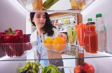 Open refrigerator with fresh fruits and vegetable. Open refrigerator