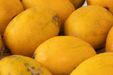 Ripe june plum (spondias dulcis). Selective focus.
