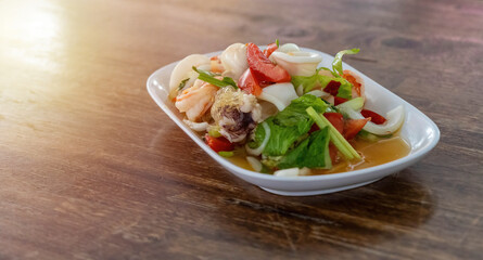 Spicy glass noodle salad. street food in Thailand.