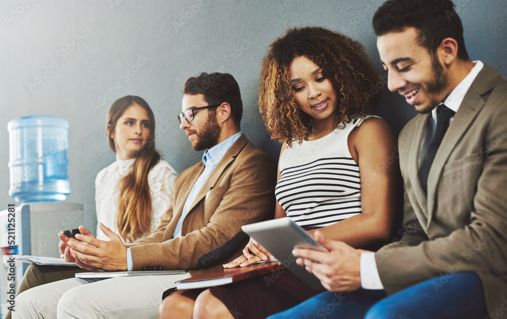 Poster Group of corporate business people in interview and talking while sitting in line, discussing with technology and networking. Diverse team, employees or adults on chairs in a row for a meeting