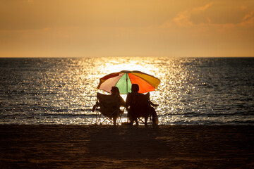 couple beach sunset 