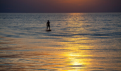 stand up paddle board sunset 