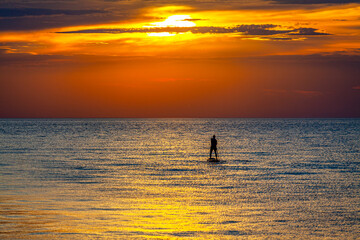 stand up paddle board sunset 