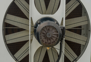 Closeup of large air conditioning cooling fan.