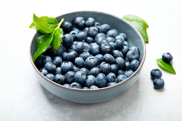 Fresh blueberry on neutral background.