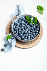 Fresh blueberry on neutral background.
