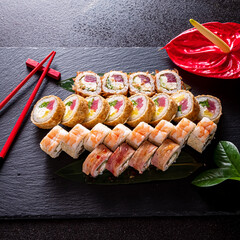 tasty sushi on the black background