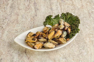 Tasty marinated mussels in the bowl