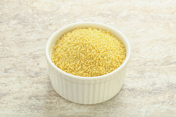 Raw couscous in the bowl