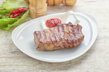 Grilled rib-eye steak beef meat