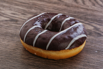 Glazed sweet tasty chocolate donut