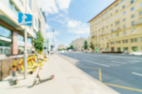 Blurred background of a city street. Blurred photo of a modern city.