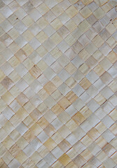 Beige braided reed texture background