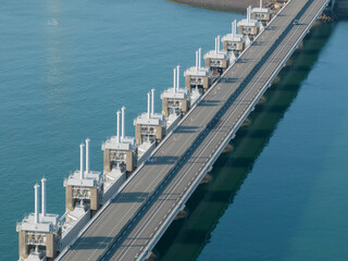 The Oosterscheldekering is a flood defense system in the Netherlands, part of the Delta Works, in...