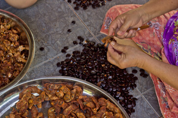 Tamarind processing, Fresh brown tamarind fruit as background