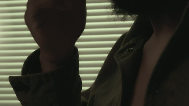 Afro Man with beard dancing to beat and sound music. closeup shot