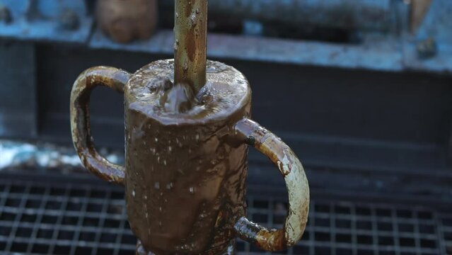 Slow motion of polishing rod moving up and down in oil pumpjack stuffing box