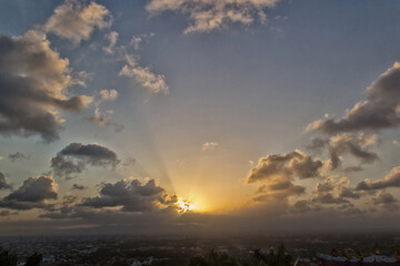 Fototapeta premium Sunrise with strong color clouds light rays and other atmospheric effect