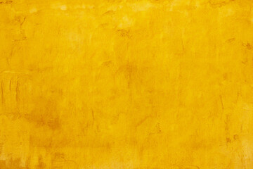 ํYellow paint wall backdrop. Rough and grunge cement surface. Artistic and stylish textures. Abstract stucco background.