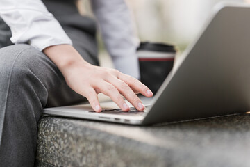 Asian business women working outdoors