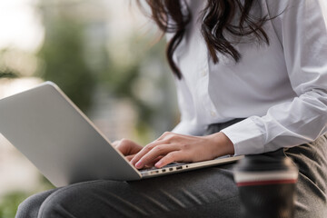 Asian business women working outdoors