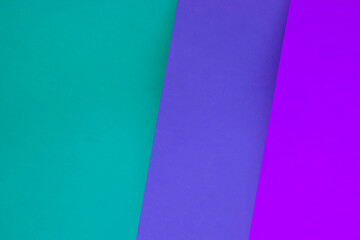 Abstract Background consisting Dark and light shades of blue green pink purple to create a three fold creative cover design