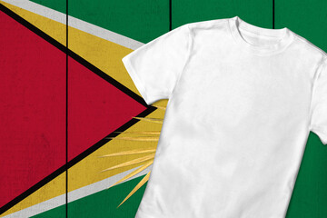 Patriotic t-shirt mock up on background in colors of national flag. Guyana