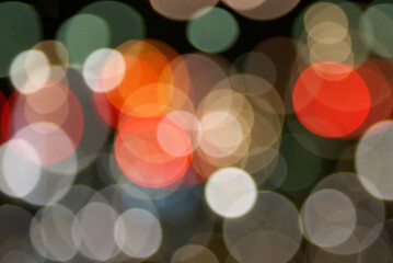 Bokeh lights background abstract multi colored on the night in the city.