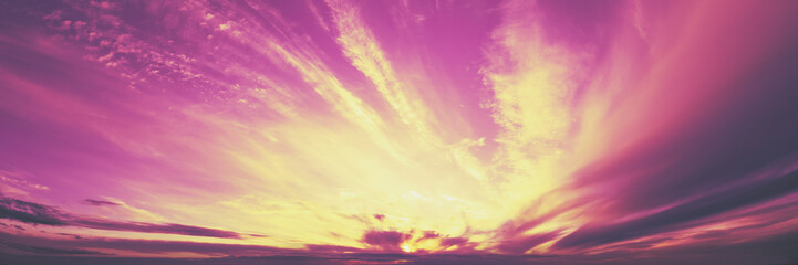 Fototapeta na wymiar Colorful cloudy sky at sunset. Horizontal banner