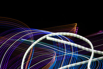 Beautiful Abstract futuristic painting color texture with lighting effect. Modern dynamic shiny pattern. Fractal graphic artwork design. Creative long exposure photography. Abstract lights at night.