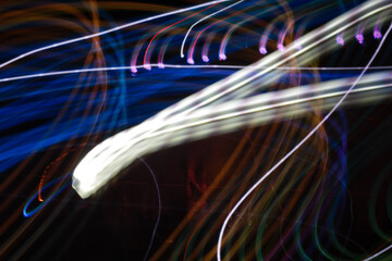 Beautiful Abstract futuristic painting color texture with lighting effect. Modern dynamic shiny pattern. Fractal graphic artwork design. Creative long exposure photography. Abstract lights at night.
