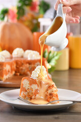 Slice of Pumpkin and cottage cheese casserole with caramel topping on a plate. This is a delicious...