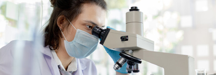 Scientists or researchers perform microscopic endoscopy to examine changes in the chemical...