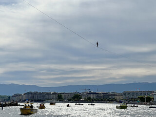 French tightrope walker Nathan Paulin walks on a 950 meters long slackline, 50 meters over Geneva...