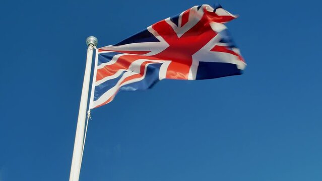 flag of UK against blue sky