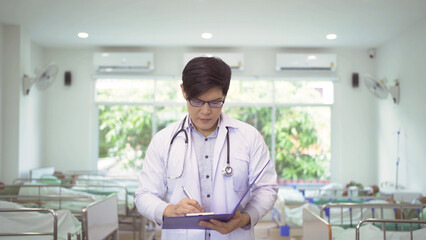 Obraz premium Portrait of an Asian doctor with group of old elderly patient or pensioner, in nursing home in hospital. Senior people lifestyle activity recreation. Health care physical therapy.